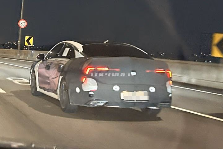 kia k5 facelift spied
