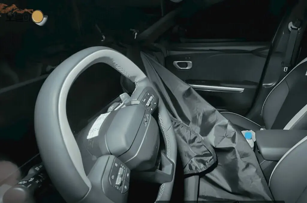 KIA K4 Interior Spied, New Steering Wheel & Logo