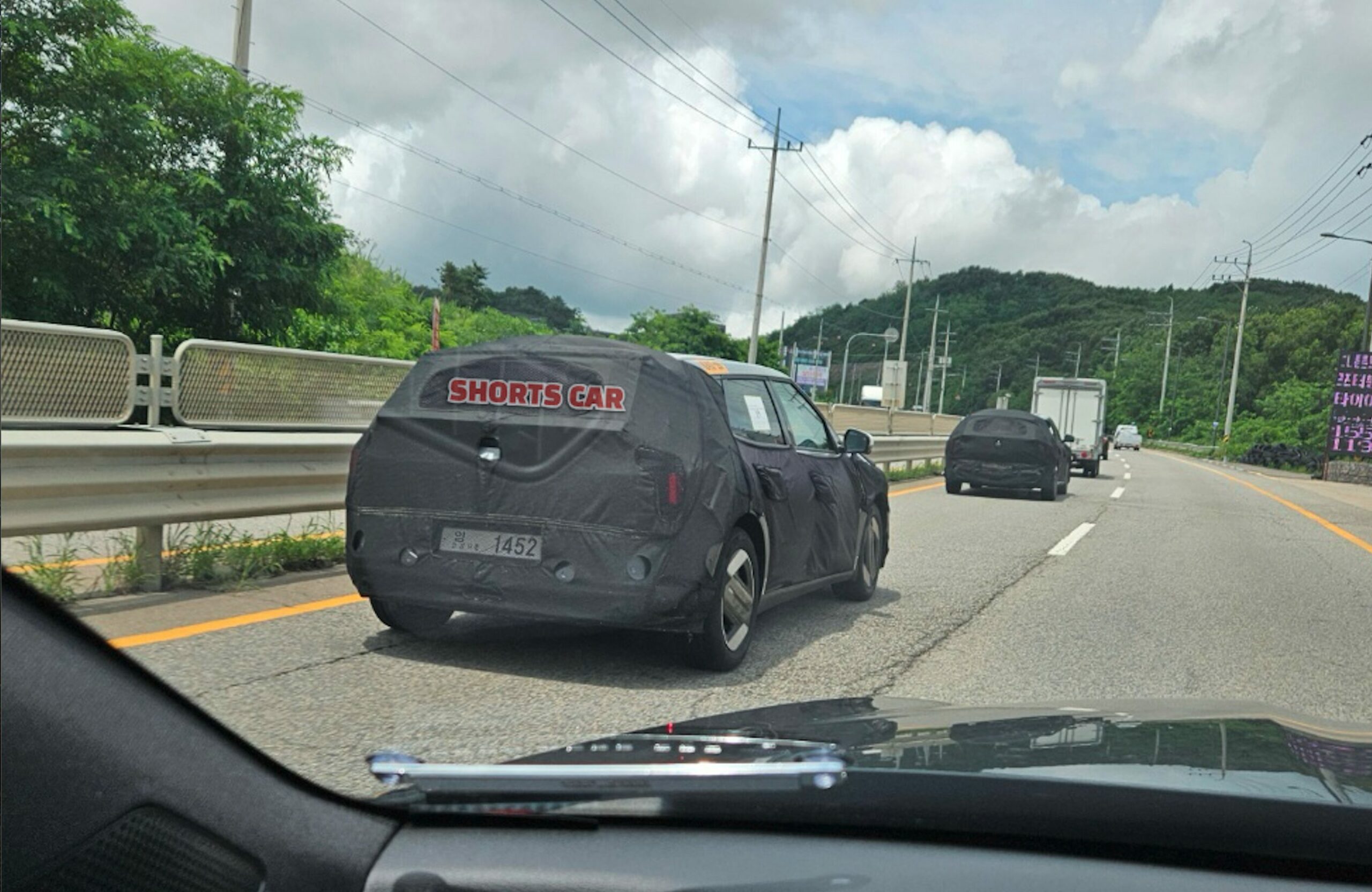 mysterious kia ev4 hatch spied 1