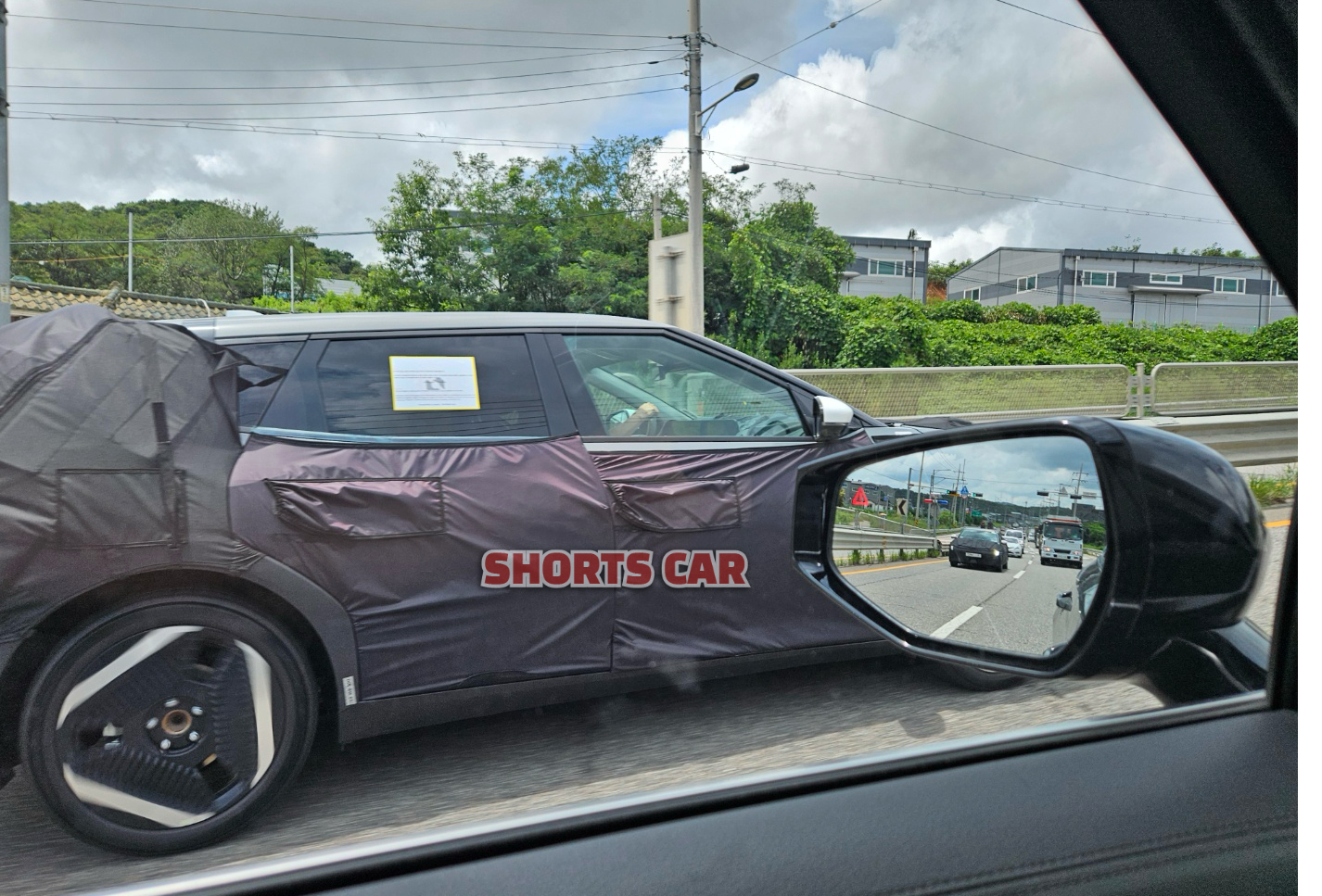 mysterious kia ev4 hatch spied 4