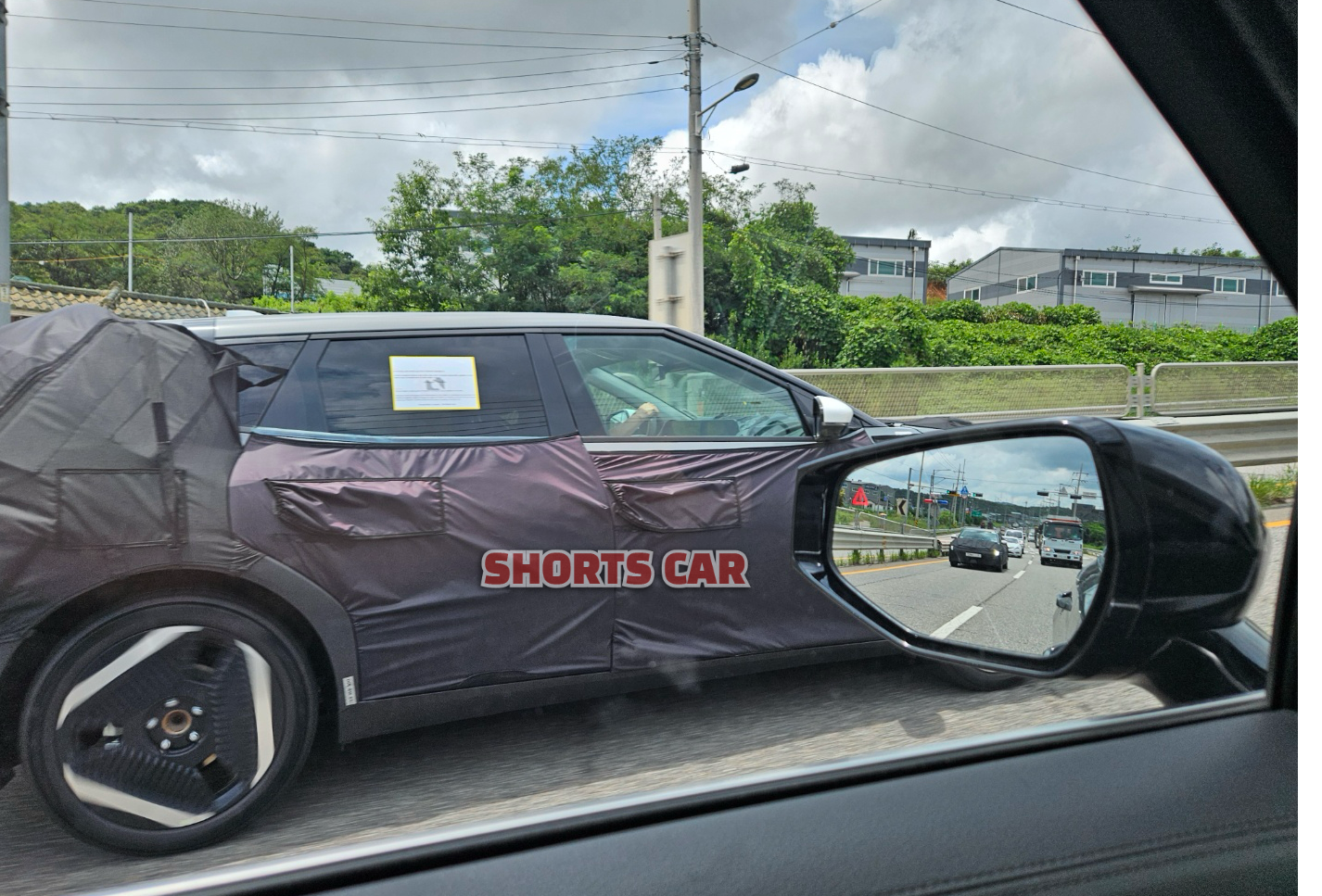 mysterious kia ev4 hatch spied 4