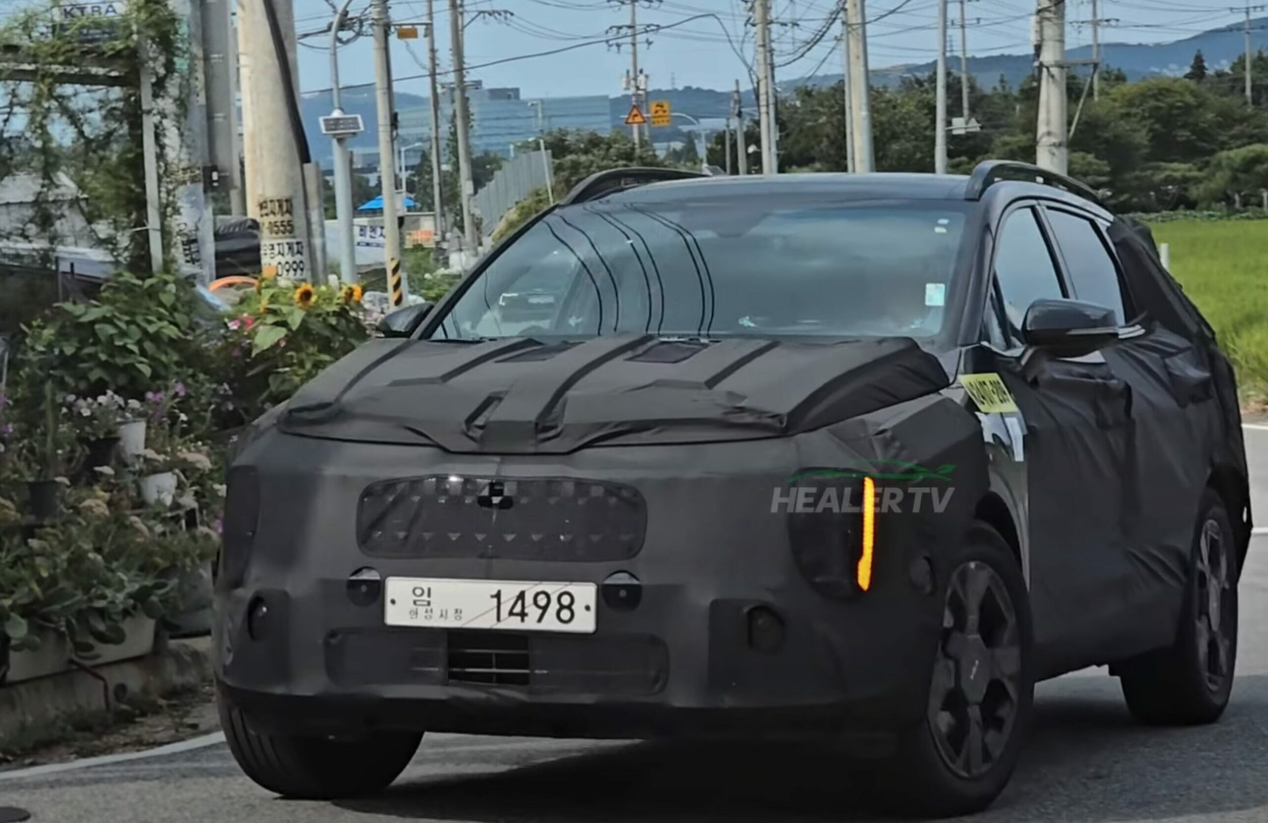 kia sportage x pro facelift spied