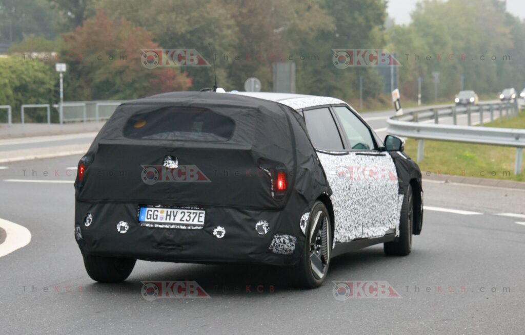 kia ev4 hatchback spied loses camouflage 9