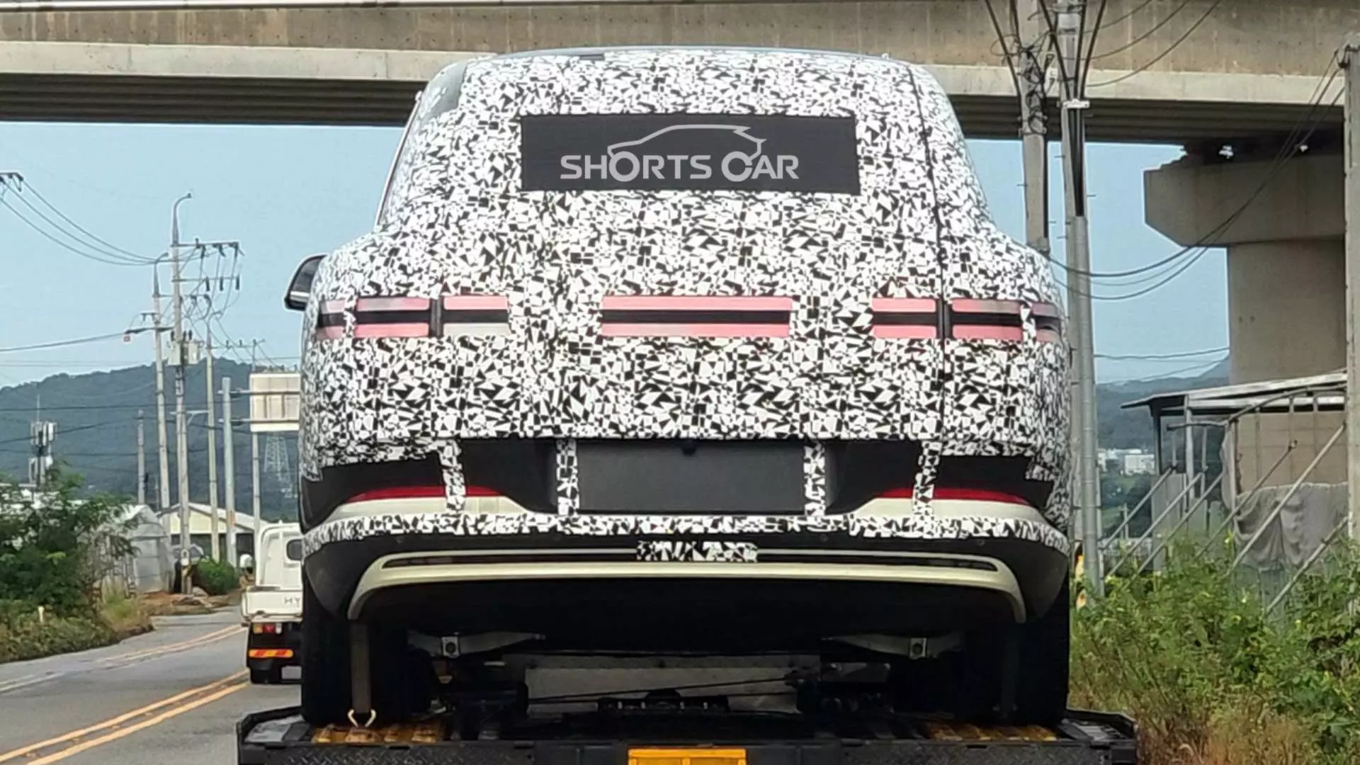 Genesis GV90 rear taillight undisguised shortscar