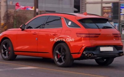 Magma-Colored Genesis GV70 Prototype Spotted with Quad-Exhausts